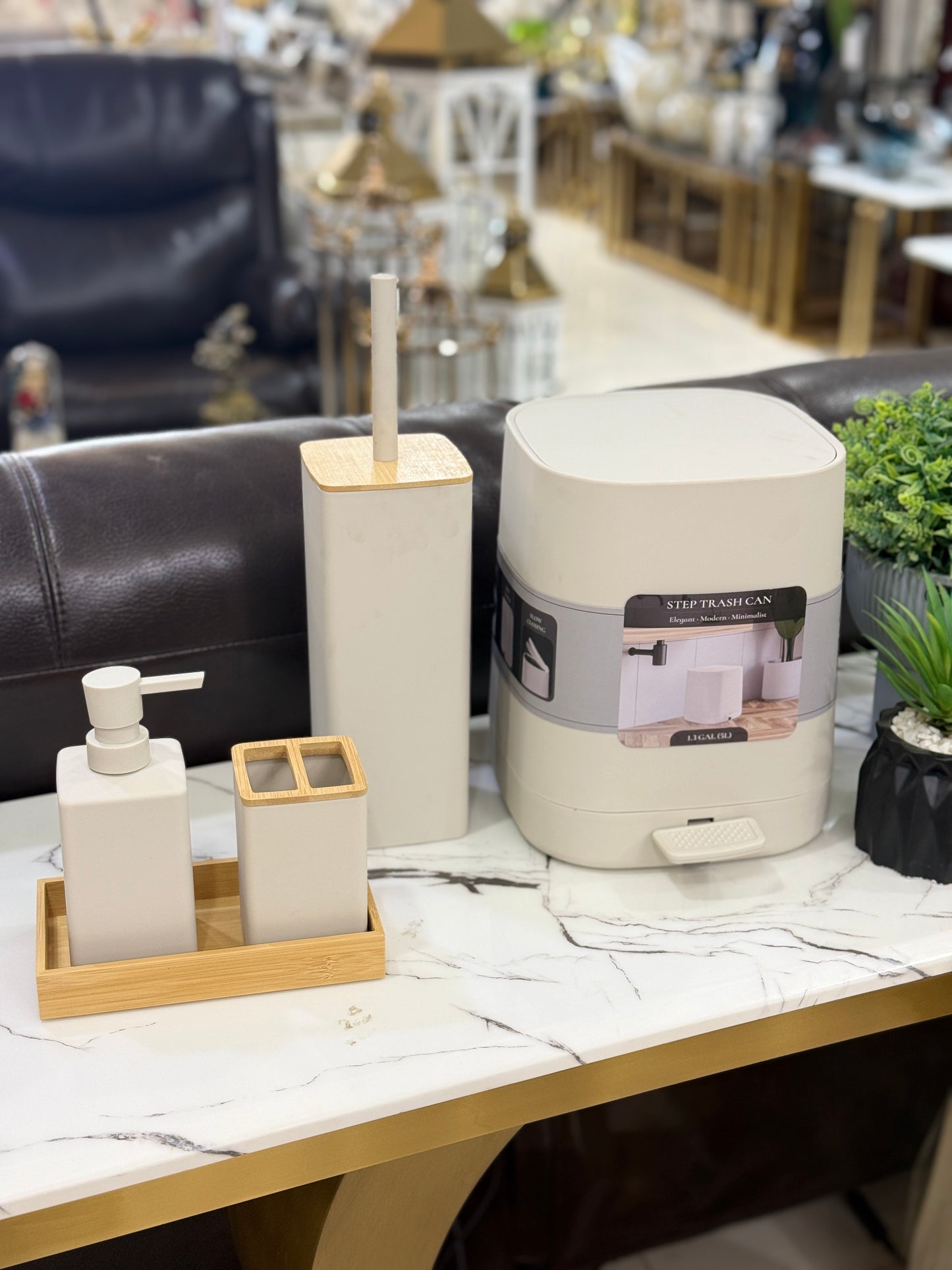 5-piece minimalist off-white bathroom accessory set with natural bamboo lids and a display tray at Fatima Home Décor store in Islamabad.