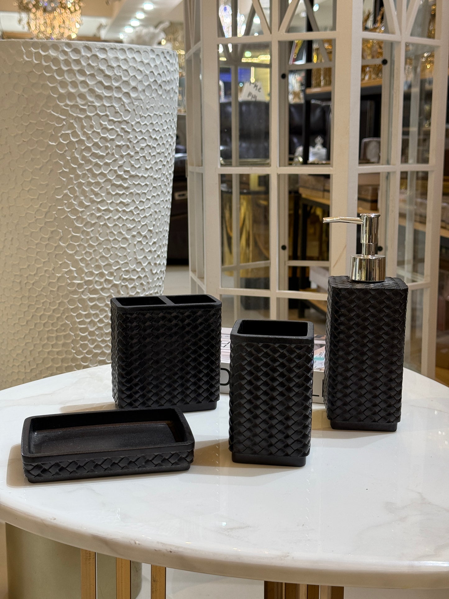 Matte black woven-texture 4-piece bathroom accessory set at Fatima Home Decor.