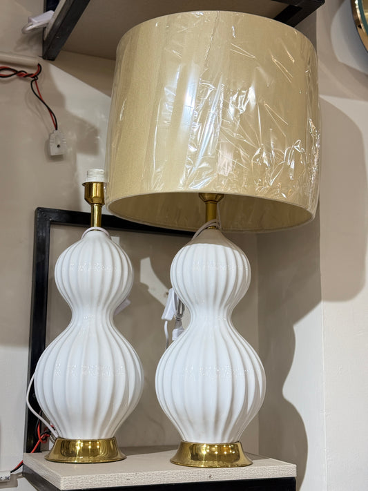 White sculptural table lamp with a ribbed ceramic gourd base and gold pedestal at Fatima Home Décor store in Islamabad.